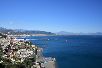 Fototapeta na wymiar View of the gulf of Salerno, in Italy. In the foreground the port and the coast in the distance.