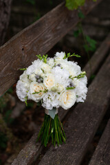 Fototapeta na wymiar Wedding bouquet of white flowers. Wedding day