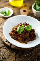 Homemade beef ragout with fresh basil