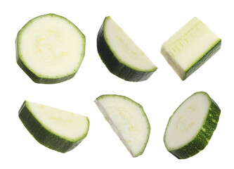Set with pieces of fresh ripe zucchini on white background