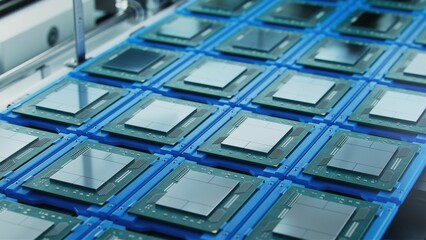 Shot of Computer Processor Production Line at Advanced Semiconductor Foundry in Bright Environment....