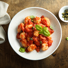 Homemade gnocchi with tomato sauce