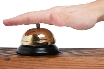 Pressing your hand on the bell of the hotel service on a white background.Concept hotel, travel and vacation.