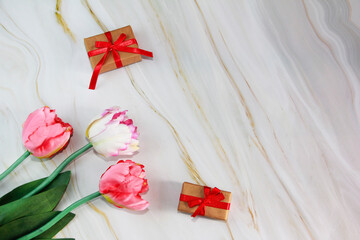 flowers pink tulips and gift box