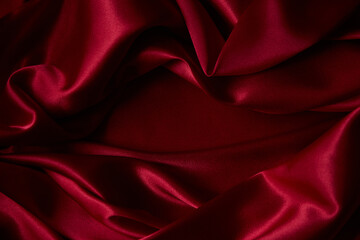 Beautiful draped silk fabric in red.