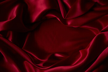 Beautiful draped silk fabric in red.