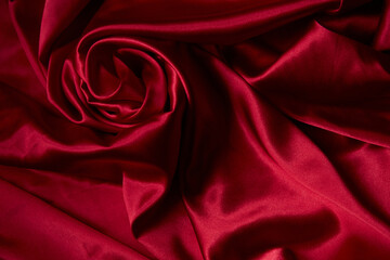 Beautiful draped silk fabric in red.
