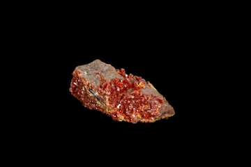 Macro mineral stone Vanadinite on a black background