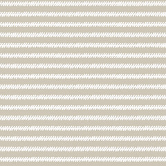 Seamless repeating pattern with hand drawn scribble, wavy lines on light brown background for craft, apparel, surface design and other design projects