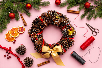 Flat lay of Christmas wreath with fir tree and decoration