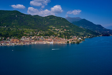 Naklejka na ściany i meble Aerial panorama of the historic part of Salò on Lake Garda. Panorama Salò, Italy aerial view.
