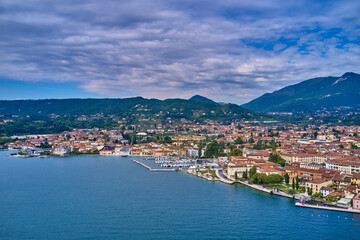 Fototapeta na wymiar Panoramic view of the historic part of Salò on Lake Garda Italy. Panorama Salò, Italy aerial view. Aerial panorama of the historic part of Salò on Lake Garda. Aerial view of the town on Lake Garda.
