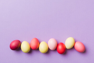 holiday preparation Multi colors Easter eggs on colored background . Pastel color Easter eggs. holiday concept with copy space