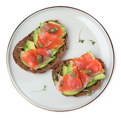 Delicious sandwiches with salmon, avocado and capers on white background, top view