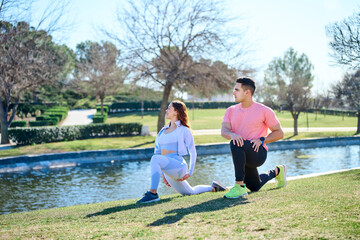 Young couple practicing sports outdoors