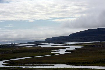 Bjarnafjardara fließt duch das Tal bei Laugarholl - Island - obrazy, fototapety, plakaty