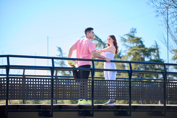Young couple practicing sports outdoors