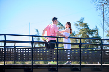 Young couple practicing sports outdoors