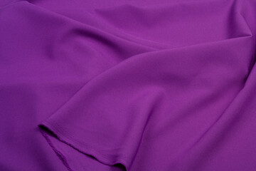 Fabric costume gabardine purple. Fabricsuit fold top view. color textile	
