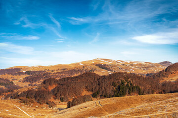 Panoramic view of Lessinia Plateau Regional Natural Park (Altopiano della Lessinia) and the mountain peak of Monte Tomba (Tomba Mountain). Bosco Chiesanuova, Verona, Veneto, Trentino, Italy, Europe