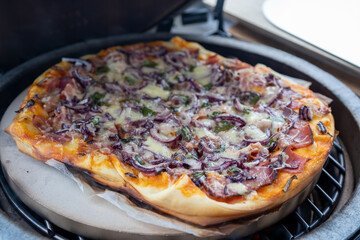 outdoor grilling - ready to eat, pizza from a grill