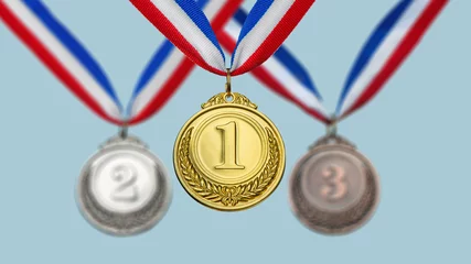 Fotobehang collection gold, silver, bronze medal against blue sky. award and victory concept © Igor Link