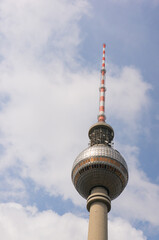 TV tower against a blue sky in low angle view