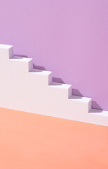 Fototapeta premium Mockup, background with stairs. Architectural element with bright sunlight and trendy shadows for graphic design, minimalism. Trend of colors 2022: very peri purple and calming coral, vertical format