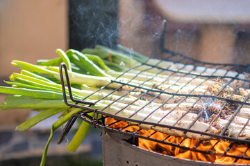 Grilled calçots (or scallions or leeks). Catalan tradition. 