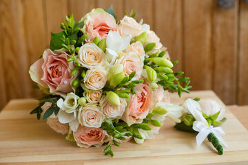 wedding bridal bouquet of roses and freesia 
