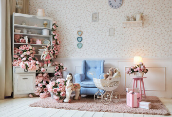 The interior of the children's room in vintage style in blue and pink tones. A chair, toys and a...