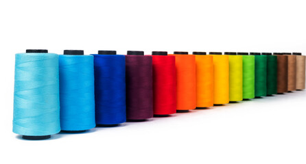 Spool of sewing thread, isolated on white background. Colored yarns used by factories in the clothing industry. Threads wound on the spool. Colored reels