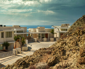 Several luxury villas on the top of the mountain.