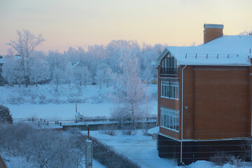 Winter landscape. Fairy-tale beauty of snow-covered streets. Snowfall and cooling in tourist areas.