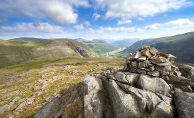 Vews of Seatoller, Base Brown, Thornythwaite Fell from the mountain summit cairn of Seathwaite Fell in the English Lake District.