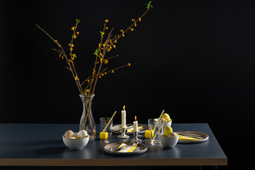 easter, holidays, tradition and object concept - close up of dinner party table serving over black background