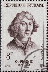 France - circa 1957: a postage stamp from France , showing the portrait of the astronomer and universal scientist Nicholas Copernicus (1473-1543)