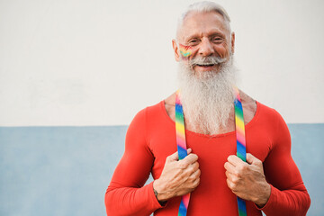 Senior gay man smiling on camera - Focus on face - obrazy, fototapety, plakaty
