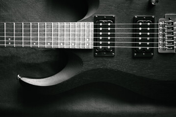 close up of a guitar, blurred focus
