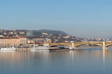 Fototapeta na wymiar Budim Danube river bank and Margaret or Margit Bridge in Budapest, Hungary