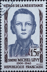 France - circa 1958: a postage stamp from France, showing a portrait of French Resistance heroine...