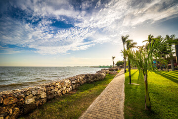 Breathtaking, scenic view of the walkway in a park on the shore of Lake Victoria in Entebbe,...