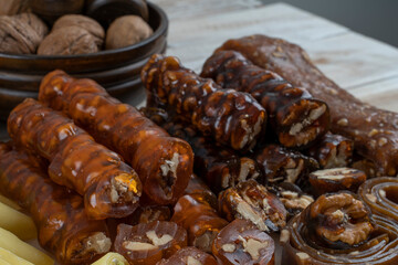 Walnut sausage. Turkish natural dried fruit pulp with walnut sausage. Kind of sweet food of Turkish cuisine.