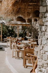 Elegant, modern and contemporary interior and exterior decor details of a chic hotel in Mykonos in Greece