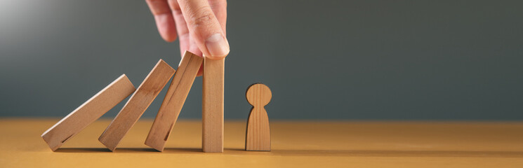 man insurance with wooden people