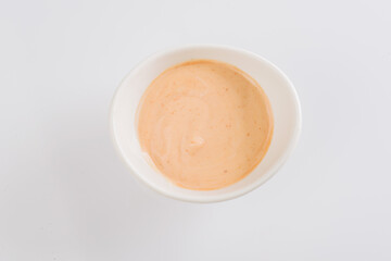 sauce on a white plate on a white background