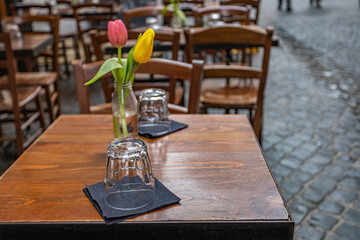 restaurant table with glass and flower. restaurant business concept