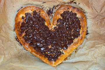 Pizza Valentine's Day, sweet dessert with chocolate and strawberries, with caramel sauce and chocolate. Step by step, third step