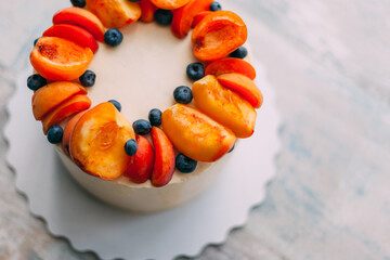 cakes close-up on a light background delicious and beautiful with berries