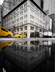 New York cab reflection in the water